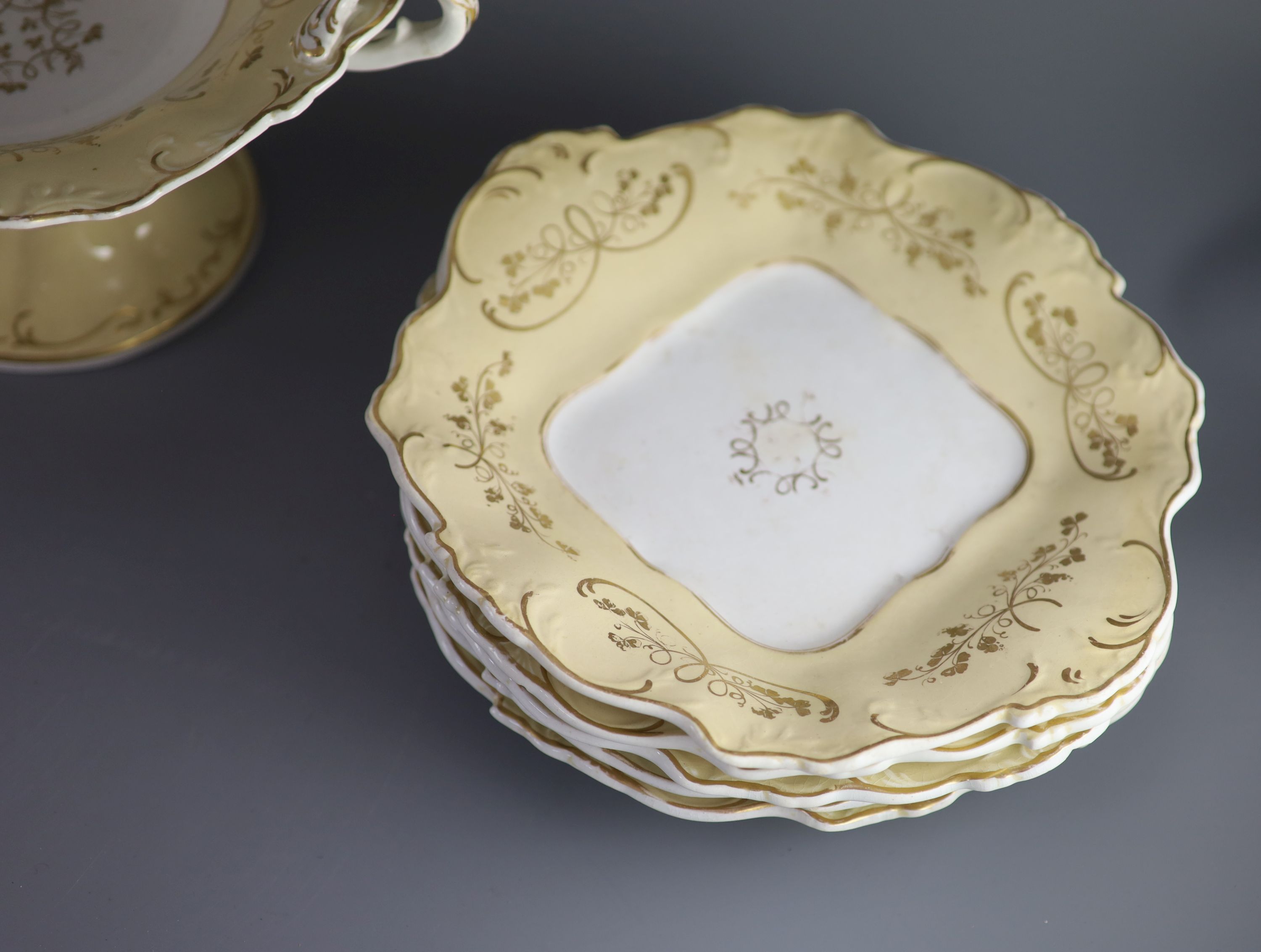 A Staffordshire cream and gilt twenty one piece part dessert service,